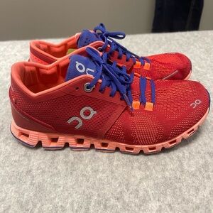 On Running Red and Blue Sneakers